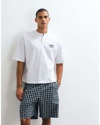 ASOS - Boxy Oversized Henley T-shirt With Chest Graphic - Lyst