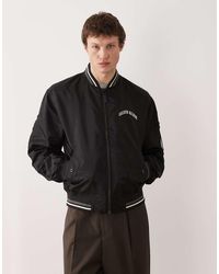 Calvin Klein - Bomberjack Van Nylon Met Grafische Print En Gestreepte Kraag - Lyst