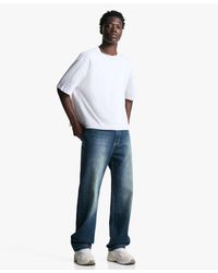 Bershka - Jeans Met Rechte Pijpen En Ruimvallende Pasvorm - Lyst