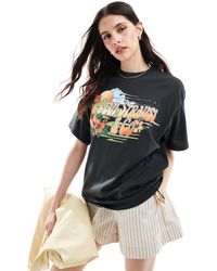 Levi's - Stack surf - t-shirt nera oversize con stampa - Lyst