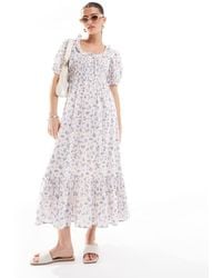 New Look - Vestito Milkmaid Midi A Fiori Con Maniche A Sbuffo - Lyst