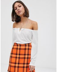 maglia con angeli bershka