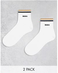 BOSS - Boss - bodywear - confezione da 2 paia di calzini bianchi a righe con logo - Lyst