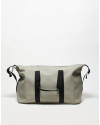 Rains - Bolso De Viaje Caqui Claro Impermeable De 36 L Hilo De -Verde - Lyst
