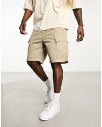 Levi's - Pantalones cortos cargo color con bolsillos carrier - Lyst