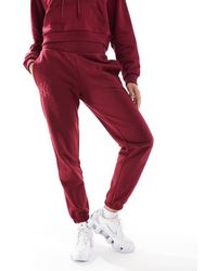 KTZ - Joggers Burdeos Con Logo De Los Ny Yankees De (Parte De Un Conjunto)-Rojo - Lyst
