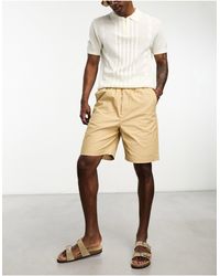 SELECTED - Pantalones cortos beis holgados con cinturilla elástica - Lyst