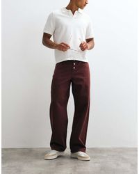 ASOS - Baggy Trousers With Exposed Buttons - Lyst
