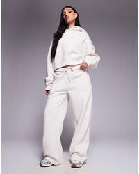 Kaiia - Bubble Embossed Logo Oversized Cropped Hoodie - Lyst