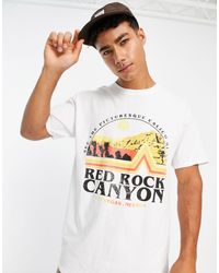 River Island - T-shirt bianca vestibilità classica con stampa red rock canyon - Lyst