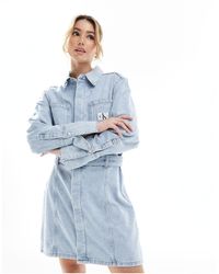 Calvin Klein - Robe chemise en jean avec ceinture - denim clair - Lyst