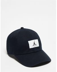Nike - Gorra negra con parche del logo - Lyst