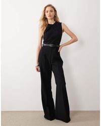 Mango - High Neck Sleeveless Jumpsuit With Statement Belt - Lyst