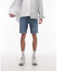 Tommy Hilfiger - Pantalones Cortos Vaqueros De Corte Slim Con Lavado Medio Y Dobladillos Vueltos Scanton De -Azul - Lyst