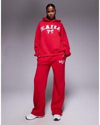 Kaiia - Joggers Rojos Y Rosas De Pernera Ancha Con Logo Y Lazo Bordado De Mezcla De Algodón De (Parte De Un Conjunto) - Lyst