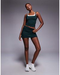 4505 - Tennis Active Double Layer Tank With Cross Strap Back - Lyst