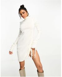 Missy Empire - Missy Empire Roll Neck Ruched Knitted Mini Dress - Lyst