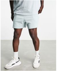 Reebok - Pantalones cortos gris marinero básicos wardrobe essentials - Lyst