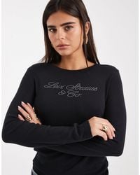Levi's - Essential - t-shirt à manches longues et logo pailleté - Lyst