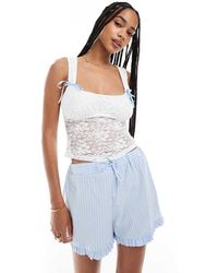 Miss Selfridge - Korsettop Van Kant Met Print, Strikjes En Bloemen - Lyst