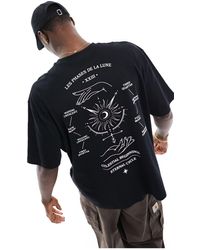 ASOS - Camiseta negra extragrande con estampado celestial en el pecho y la espalda - Lyst