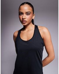 4505 - Icon Light Weight Chuck On Quick Dry Performance Tank Top - Lyst