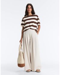 Oysho - Cotton Wide-Leg Pique Pleated Trousers - Lyst