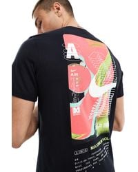 Nike - Camiseta negra con estampado en la espalda - Lyst