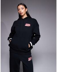 Nike - Phoenix fleece - sweat à capuche oversize avec imprimé au dos - Lyst