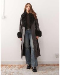 Reclaimed Vintage - Longline Leather Look Trench Coat With Faux Fur Collar And Cuffs - Lyst