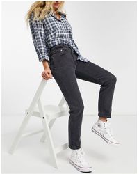 724 - jeans multitasche corti dritti a vita alta di Levi's in Verde | Lyst
