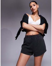 4505 - Pantalones Cortos De Chándal Negros De Estilo Deportivo De Tejido De Secado Rápido Icon De - Lyst