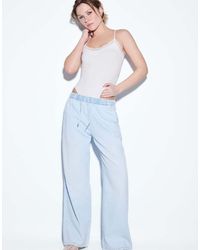 Stradivarius - Flowy Denim Trousers With Drawstring - Lyst