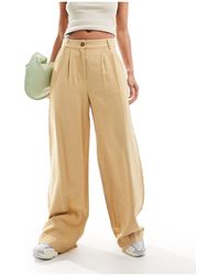 Vero Moda - Aware - pantaloni larghi con pieghe color cammello - Lyst