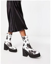 Koi Footwear - Koi - holy - bottines à imprimé vache avec semelle chunky et talon - Lyst