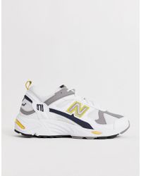 new balance x90v1 cream and yellow trainers
