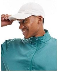 Nike - Club - casquette avec logo virgule métallisé - ivoire - Lyst