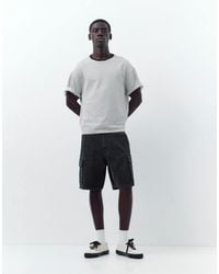 Pull&Bear - Bermuda baggy cargo - noir délavé - Lyst