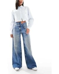 Pull&Bear - Jeans A Fondo Ampio Medio Con Fascia Incrociata - Lyst