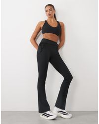 4505 - Kick Flare Yoga legging With Tie Waist Detail - Lyst