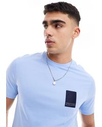 Armani Exchange - T-shirt azzurra con riquadro piccolo del logo - Lyst