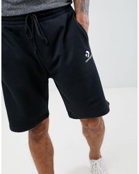 black converse with shorts