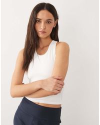 4505 - Icon Racer Back Vest With Inner Bra And Removable Padding - Lyst