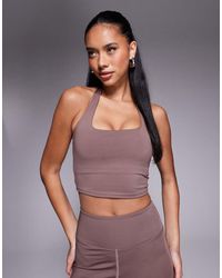 4505 - Canotta Tecnica Allacciata Al Collo Color Tortora Con Reggiseno Interno - Lyst