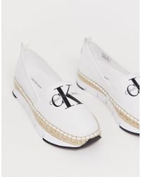 sandalias y chanclas de Alpargatas y sandalias Mujer Zapatos de Zapatos planos Espadrillas de Calvin Klein de color Rosa 