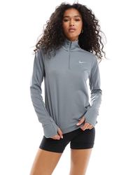 Nike - Top De Manga Larga Con Media Cremallera Pacer Dri-Fit De - Lyst