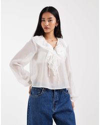 ONLY - Blouse nouée devant à volants - Lyst