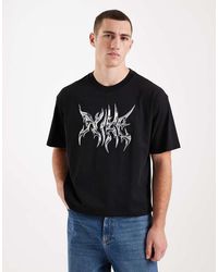 Nike - Camiseta Negra De Corte Cuadrado Extragrande Con Estampado Gráfico - Lyst