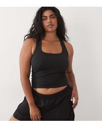4505 - Curve Seamless Rib Scoop Neck Vest With Racer Back - Lyst