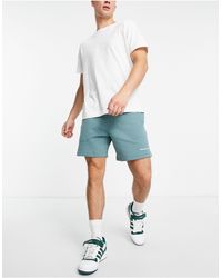 adidas Originals - Pantalones cortos esmeralda apagado básicos premium - Lyst